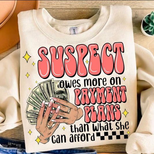 Suspect owes more on payment plans than she can afford